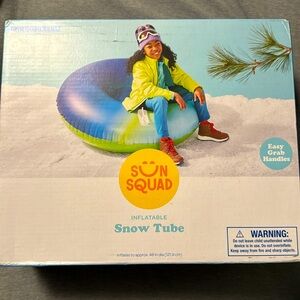 Inflatable snow tube from SunSquad. It’s a Blue ombré with Lime Green.